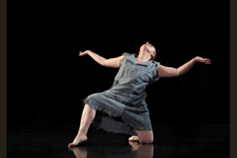 Performer in a dance pose