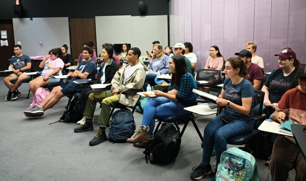 Students listen to experts describe careers in the game industry.