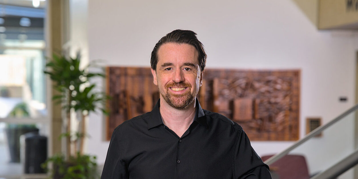 A headshot of Mike Poblete