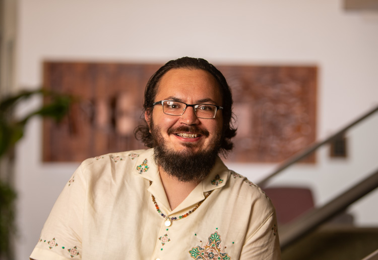 A headshot of Jam Martinez