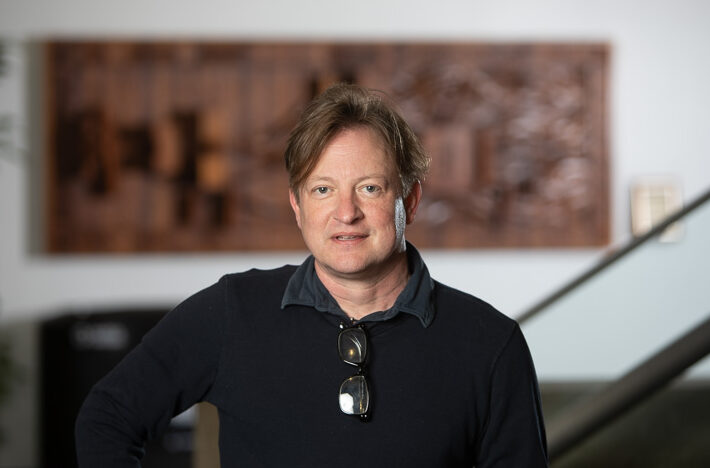 A headshot of Toby Pipes