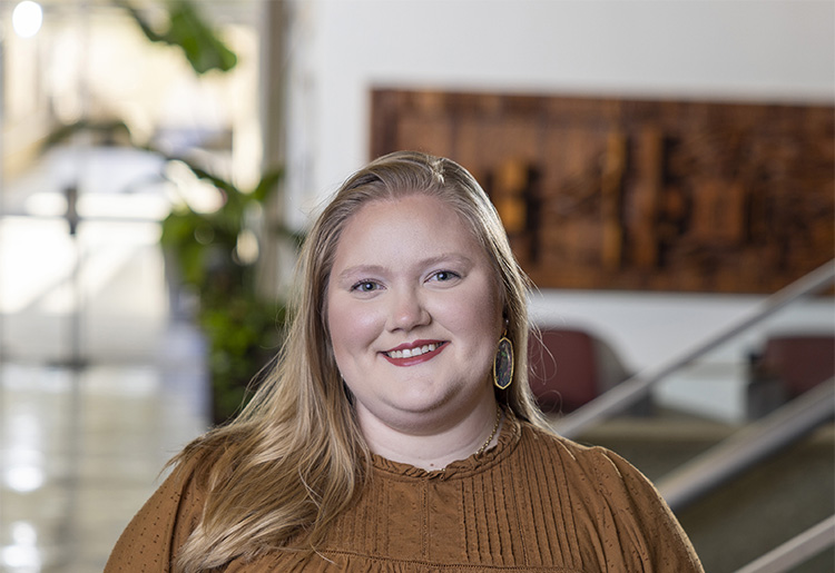 A headshot photo of Grae Robinson