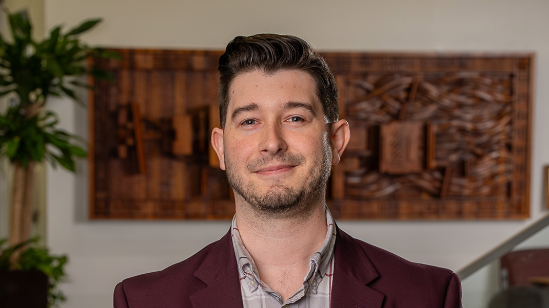 Headshot of Nicholas Hatt.