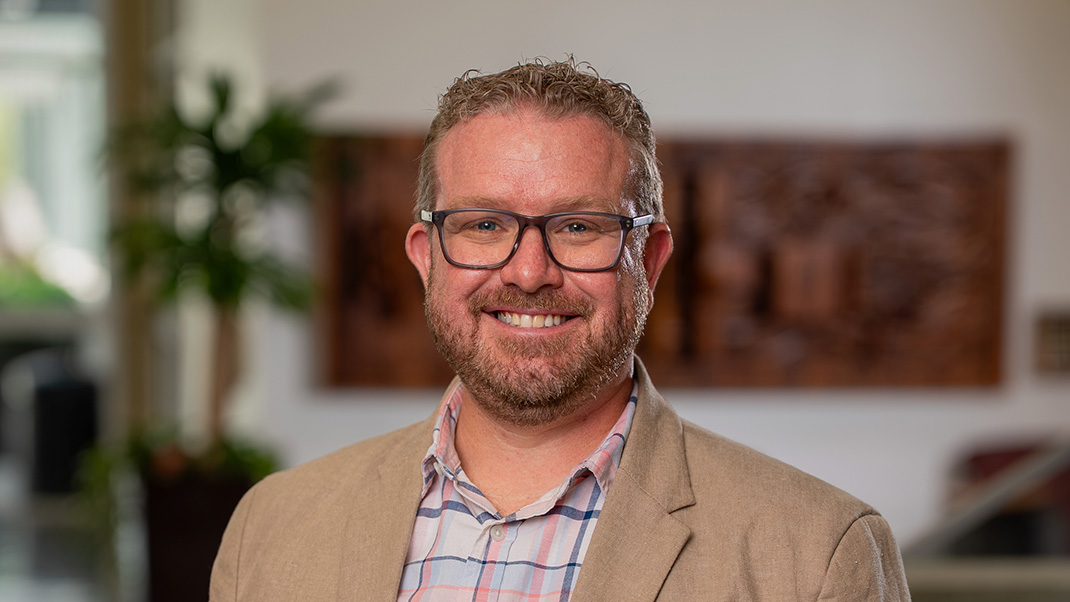 Headshot of Dan Monroe.