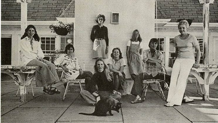 A black and white flier with a photo of eight women artists. Text includes